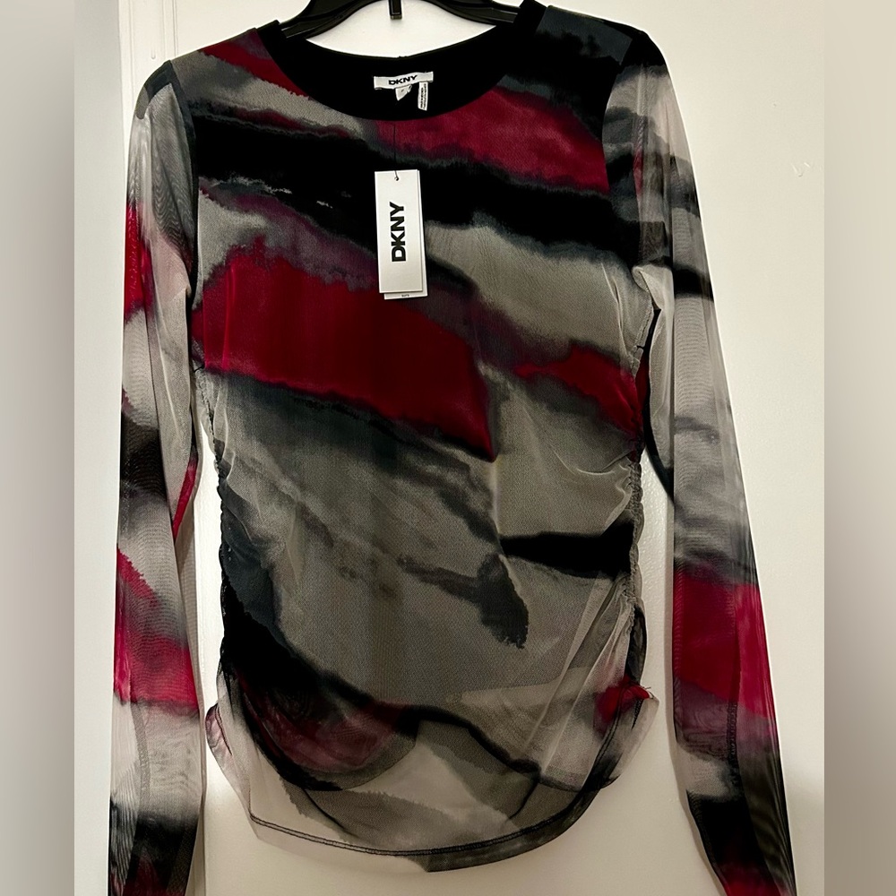 DKNY woman’s dress shirt..NWT
